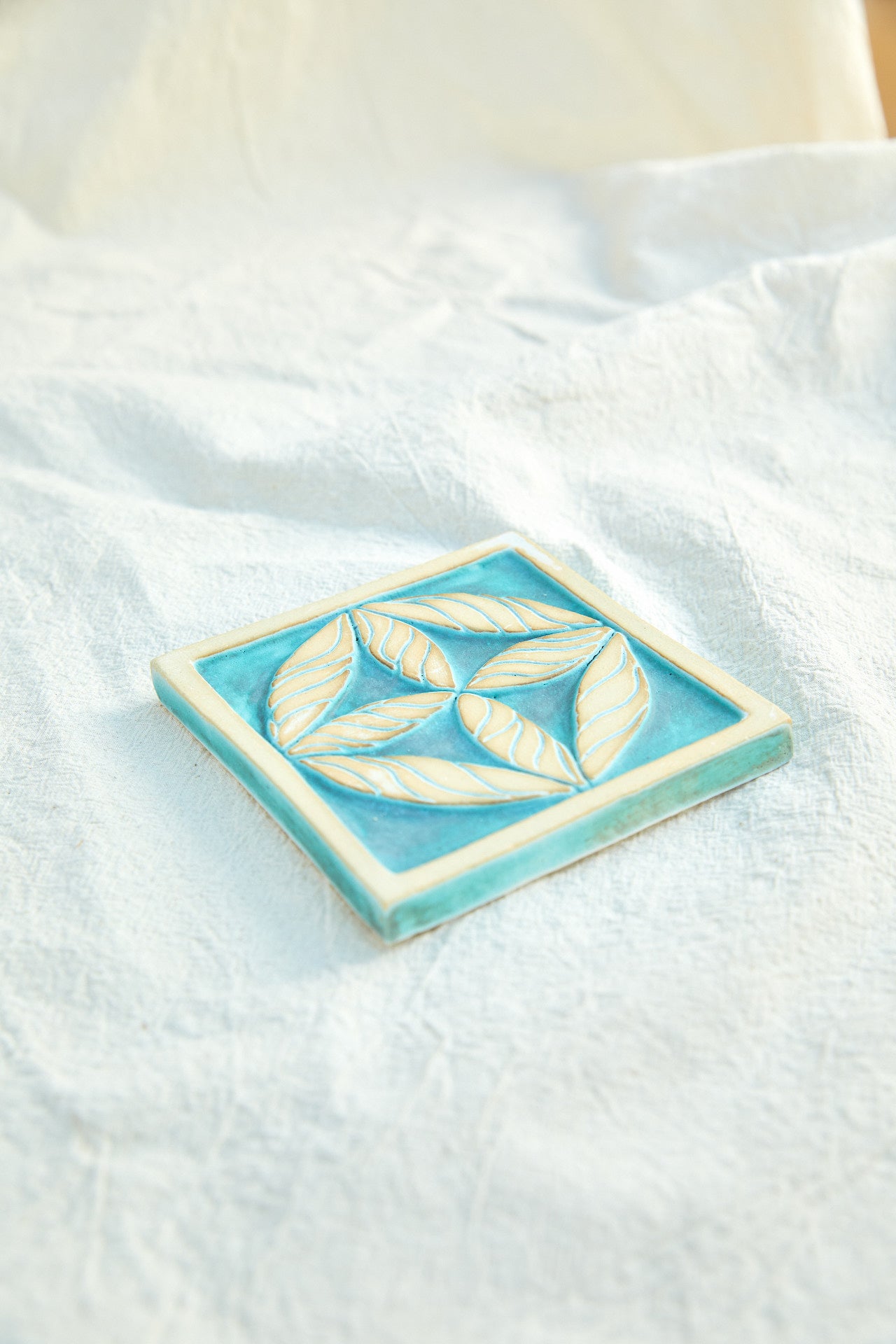 Turquoise Cross Leaf Tile