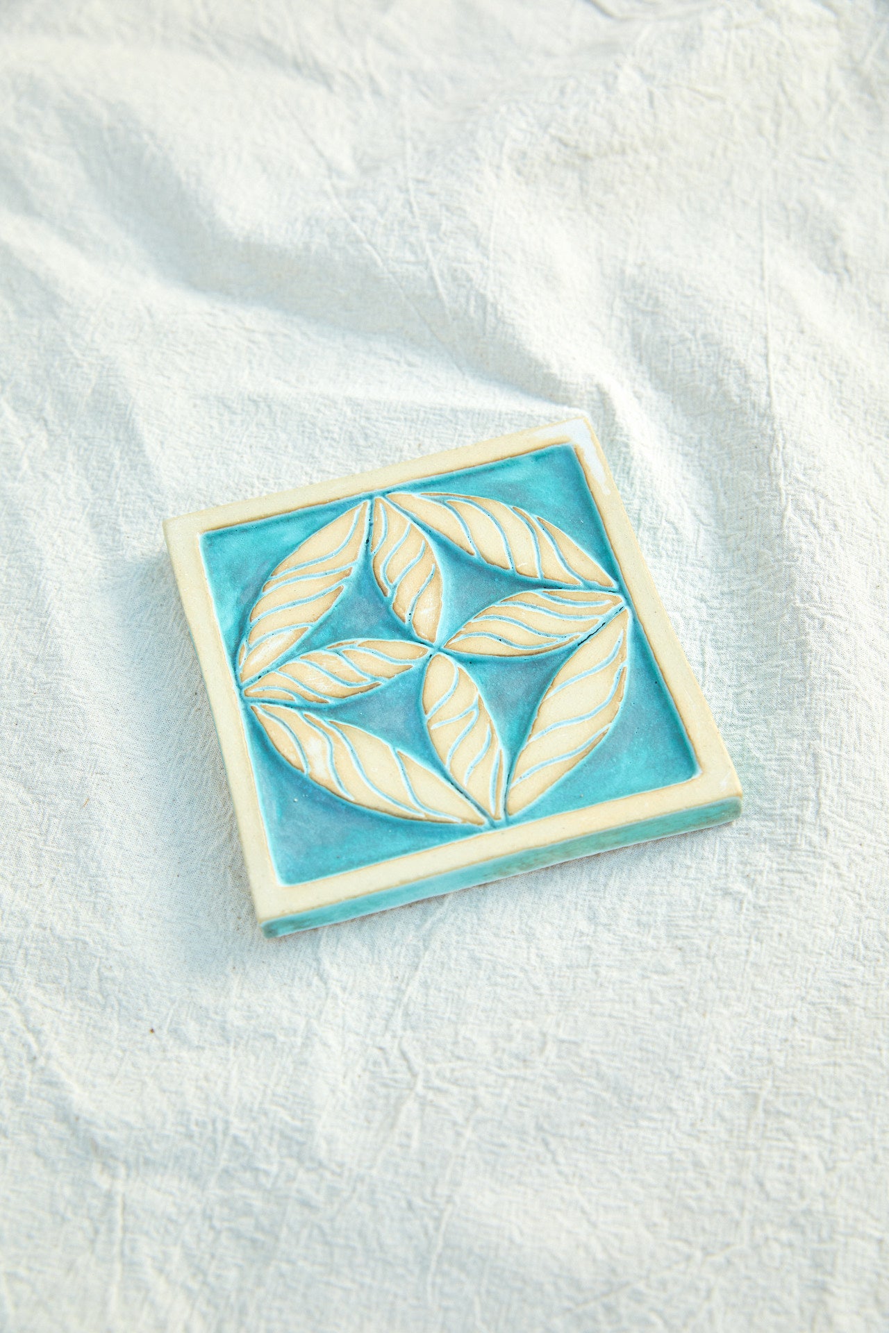 Turquoise Cross Leaf Tile